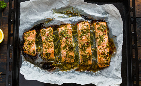 Baked salmon with herbs and lemon fresh out of the oven