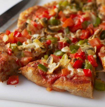 Image of Veggie Pizza Pita Pockets recipe on a plate.